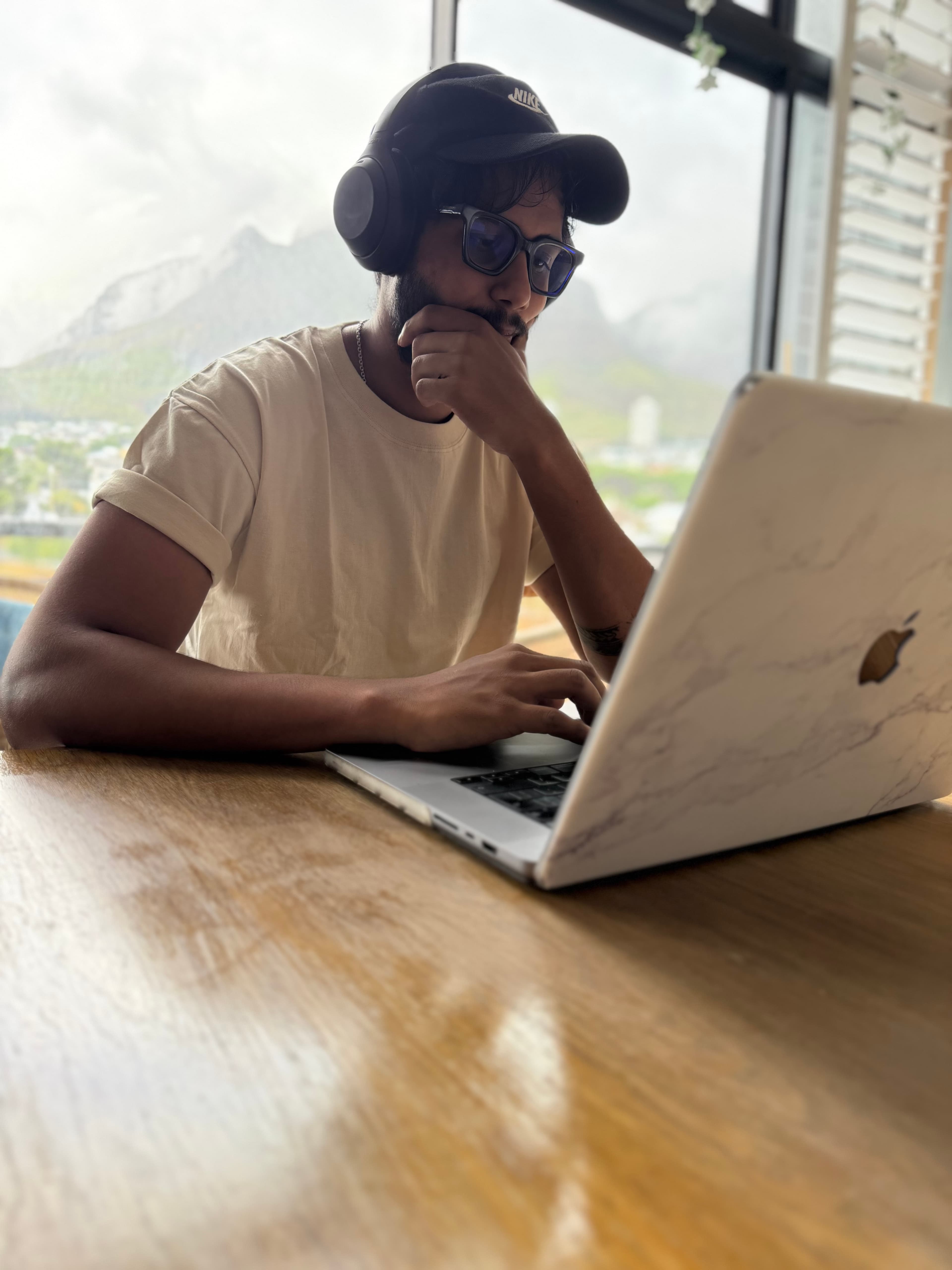 Akhil working on his laptop